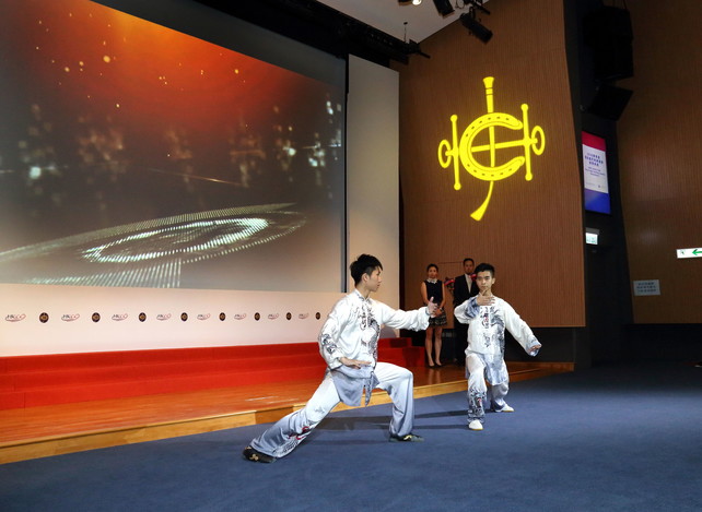 The world taijiquan champion Yeung Chung-hei (right) and Asian wushu champion Hui Tak-yan (left) demonstrate at the Ceremony double taijiquan, mixed with special audio and visual effects, for introducing the nominees for the Coach of the Year Awards.